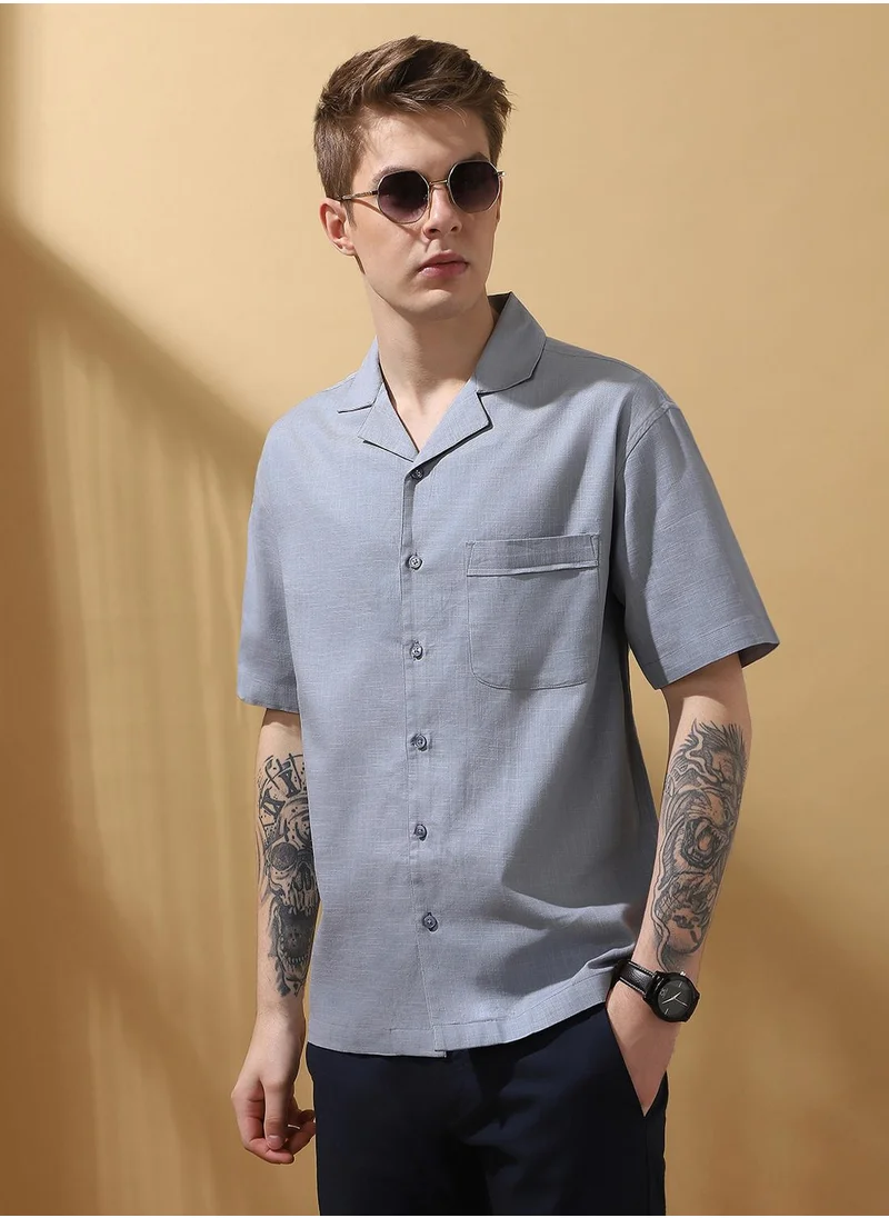 Dennis Lingo Upgrade your wardrobe with this premium Light blue Relaxed fit Shirts Textured design crafted from Cotton Slub featuring Half Sleeve with Button closure.