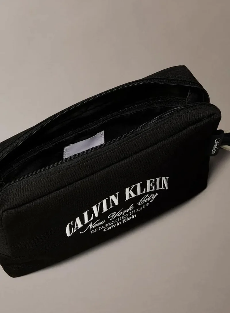 Calvin Klein Black Logo Graphic Pouch for Men | Best Price UAE