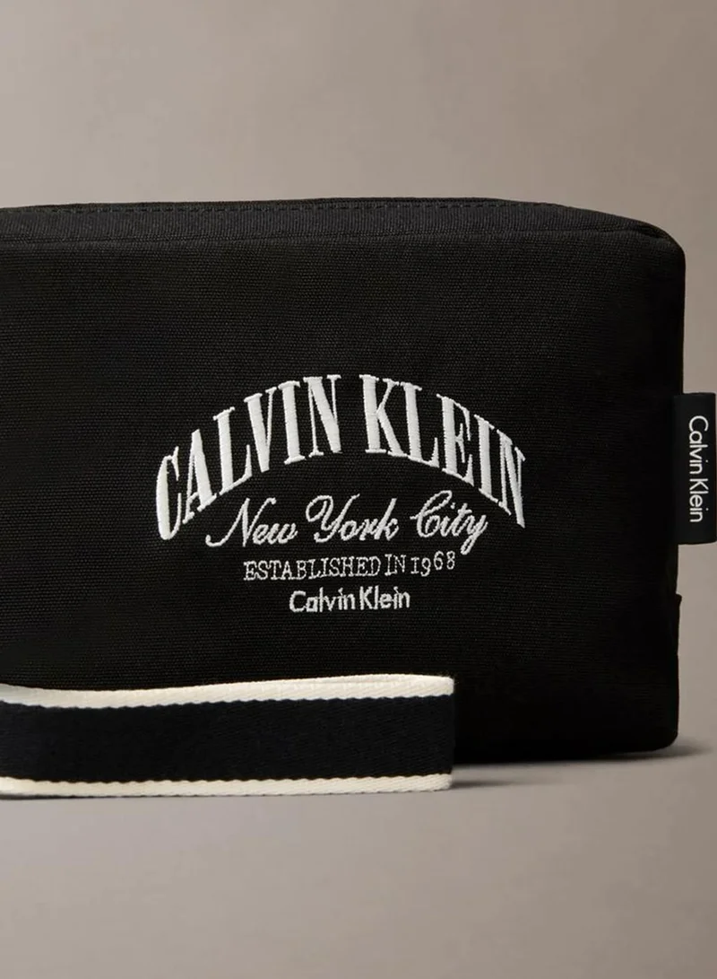 Calvin Klein Black Logo Graphic Pouch for Men | Best Price UAE