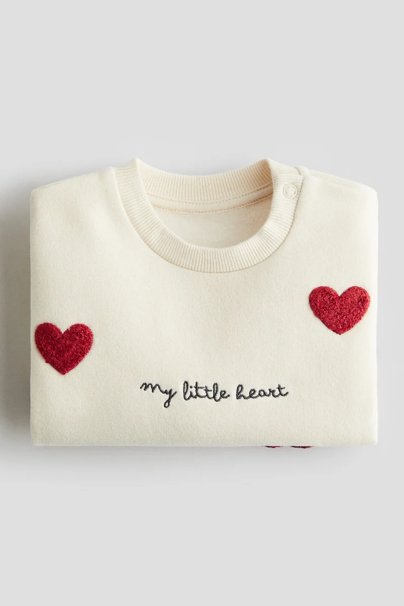 اتش اند ام سويت شيرت مزين بزخارف