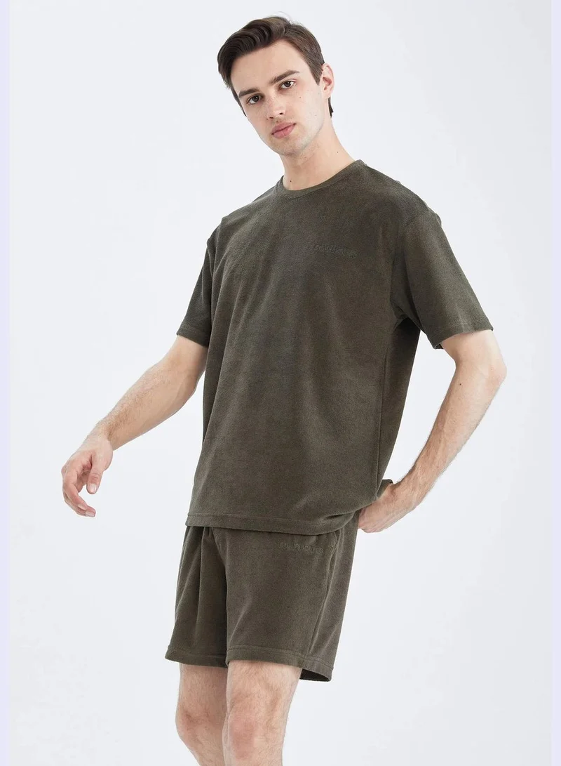 ديفاكتو Boxy Fit Short Sleeve T-Shirt