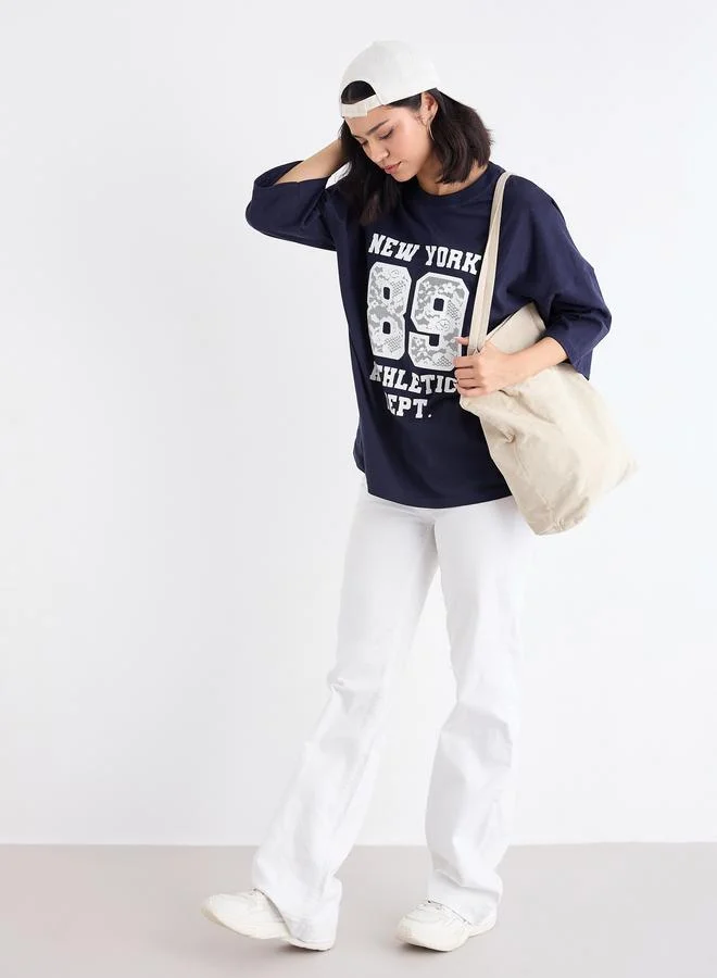 ستايلي Styli Women Navy Graphic Oversized T-Shirt with Dropped Shoulder