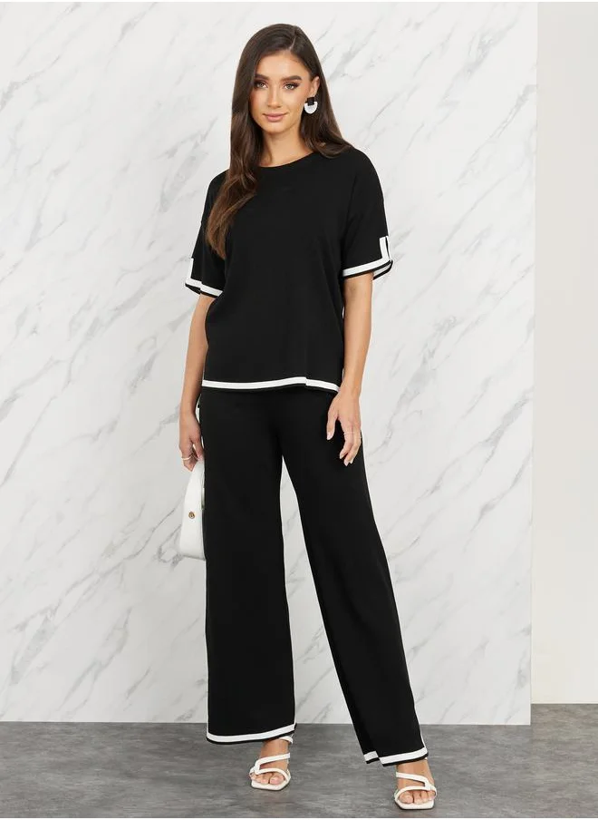 Styli Contrast Tipped Side Slit Detail Knit Blouse and Straight Leg Pant Set