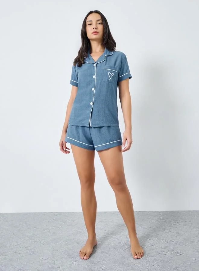 تايك تو مجموعة من شورت وبلوزة بتفاصيل أنابيب متباينة