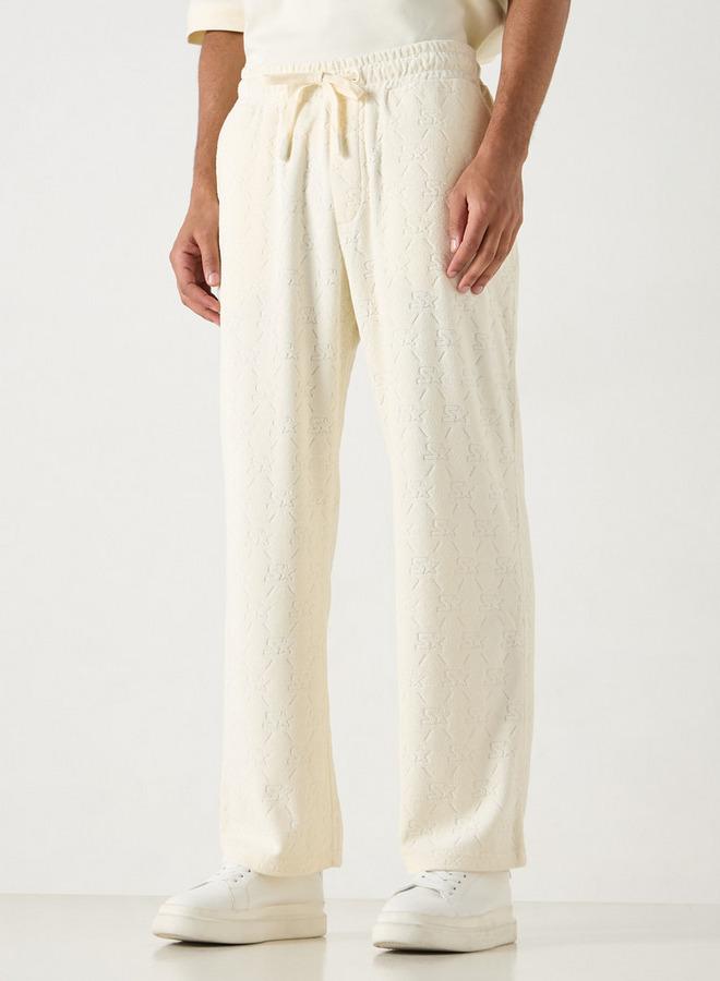 Starter All-Over Monogram Detail Track Pants with Drawstring Closure and Pockets - Image 1
