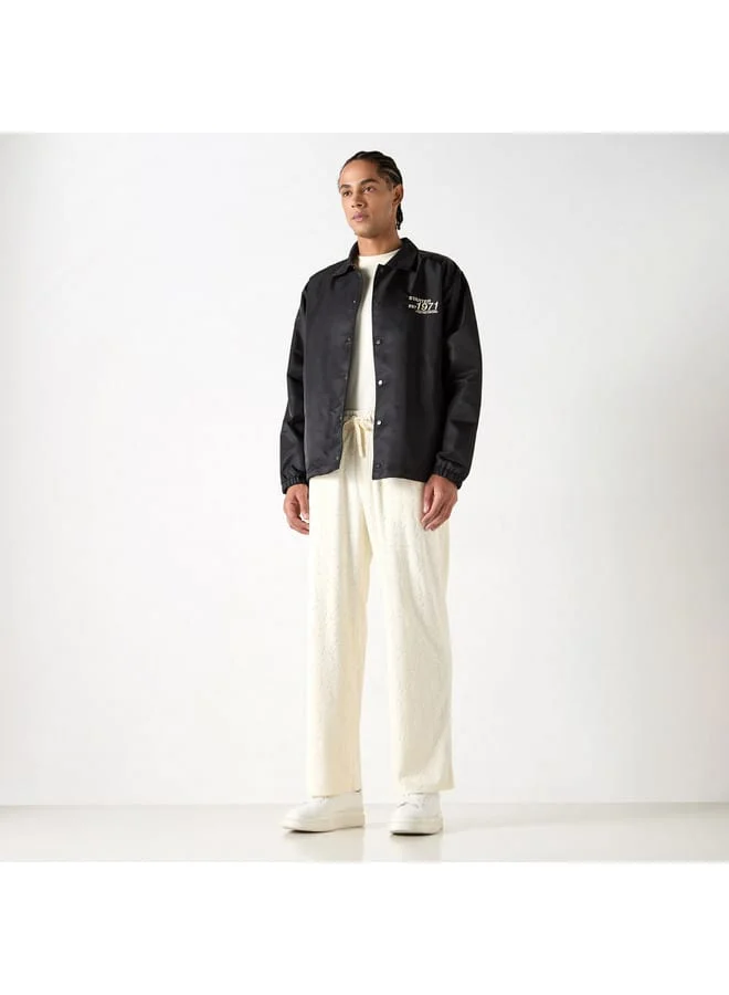 STARTER Starter All-Over Monogram Detail Track Pants with Drawstring Closure and Pockets