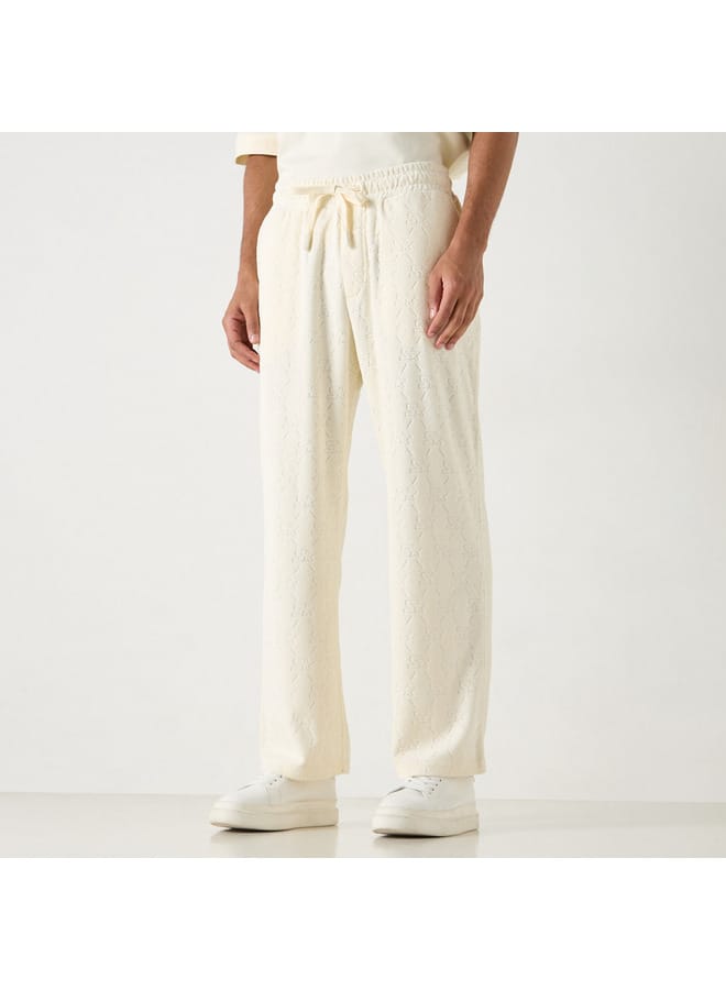 STARTER Starter All-Over Monogram Detail Track Pants with Drawstring Closure and Pockets  - Image 1