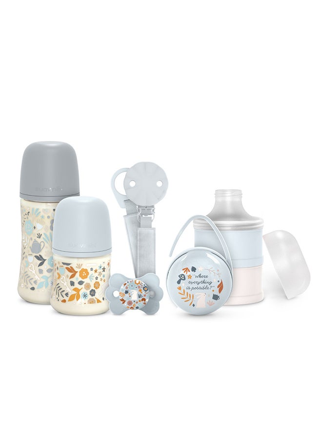SUAVINEX طقم هدايا ترحيب بالطفل مكون من 5 قطع للمواليد الجدد، زجاجات الرضاعة، مصاصة، حامل المصاصة وموزع الحليب البودرة - أزرق - Image 1