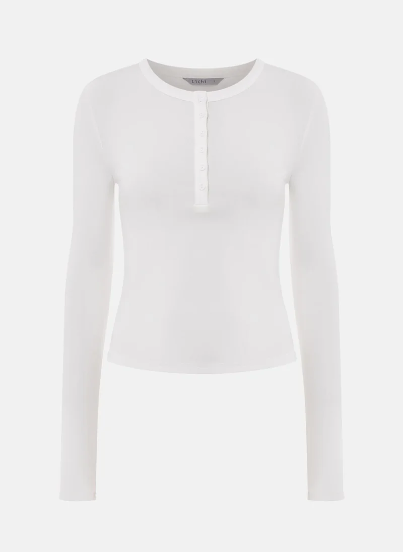 ليتشي قميص جيرسي بأكمام طويلة مع أزرار على الياقة