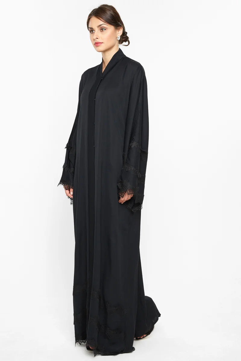 النخبة A simple yet elegant abaya with lace detailing by the sleeves and ends -AJ543A