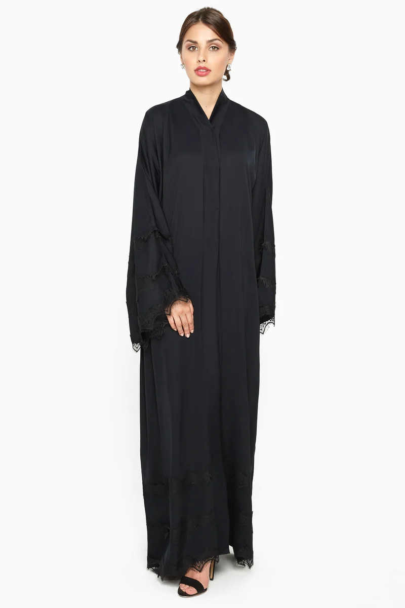 النخبة A simple yet elegant abaya with lace detailing by the sleeves and ends -AJ543A