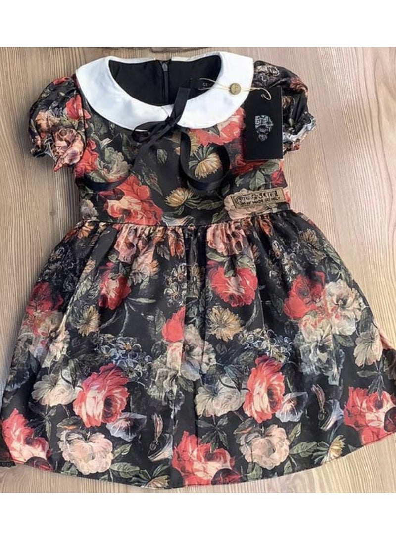 Soft, shiny, floral dress with a collar, puffy sleeves, and a buckle 