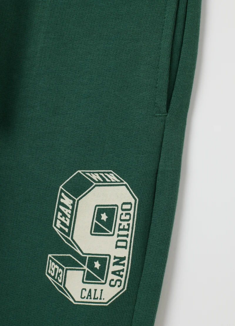او في اس CHILDREN'S GREEN REGULAR FIT JOGGER TROUSERS IN PURE COTTON