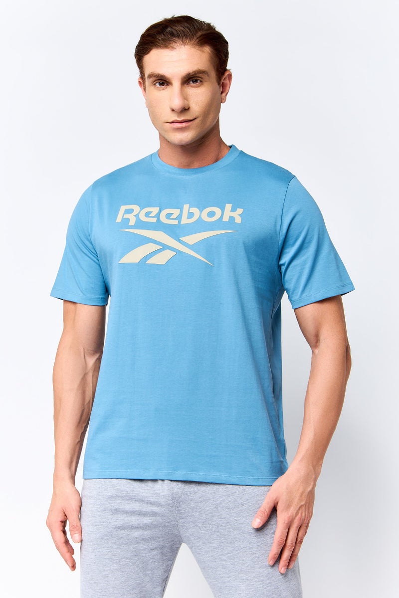 Reebok Men Sportswear Fit Short Sleeve Outdoor T-Shirt, Light Blue - Image 1