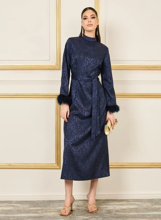 ستايلي Jacquard Faux Fur Trim Sleeves High Neck Midi Dress with Self Tie Up