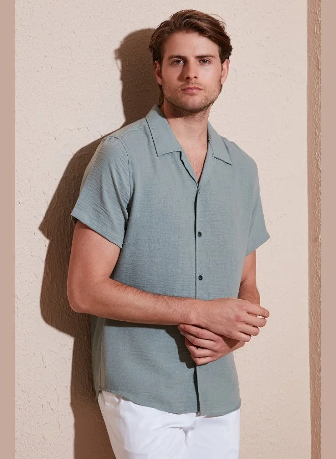 بوراتي قميص رجالي بأكمام قصيرة وياقة مفتوحة بقصة عادية من الكتان