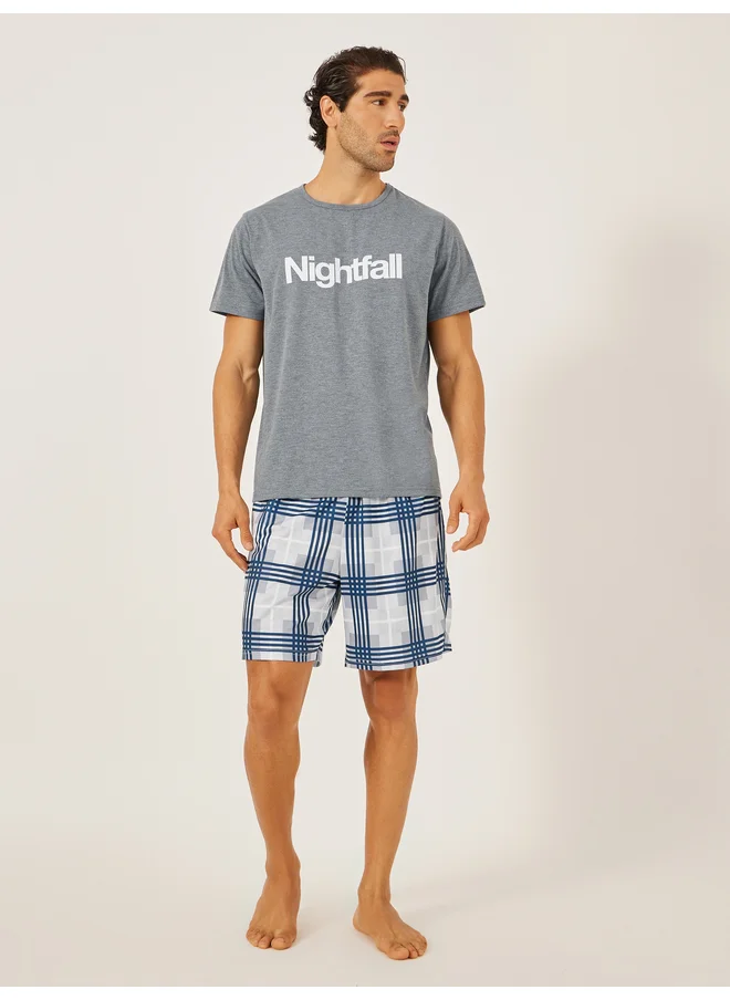 Styli Styli Unwind Slogan Printed T-Shirt and Checked Shorts Set