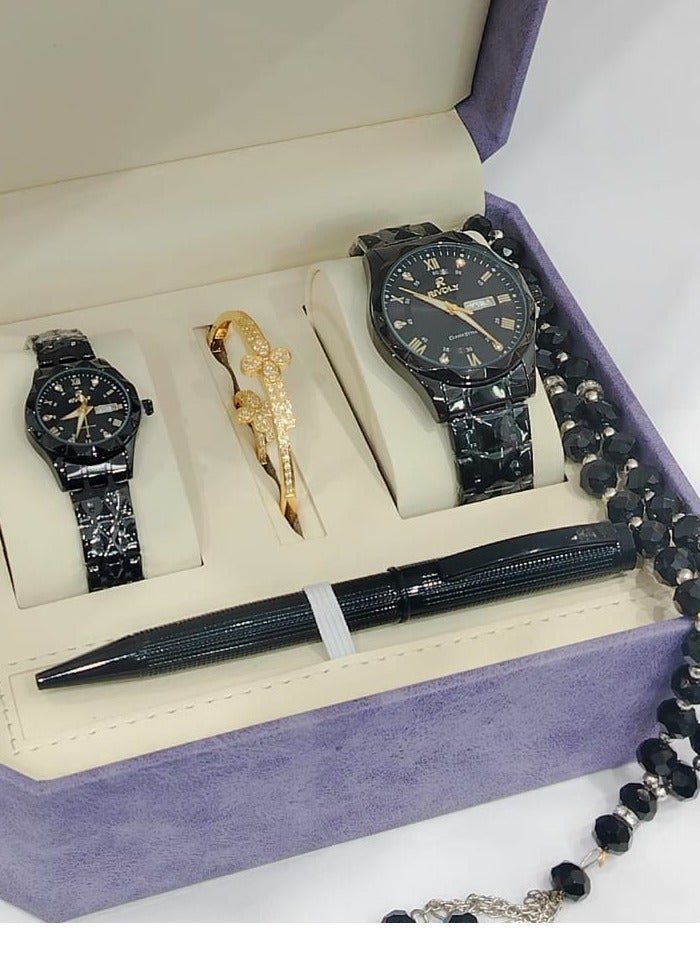 Watch set consisting of a men's watch, a women's watch, a pen, a bracelet, and a ring.