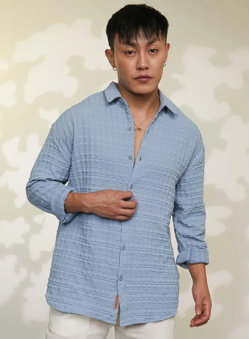 Campus Sutra Campus Sutra Men's Cornflower Blue Box-Textured Oversized Shirt For Casual Wear | Spread Collar | Long Sleeve | Button Closure | Oversized Shirt Crafted With Comfort Fit For Everyday Wear