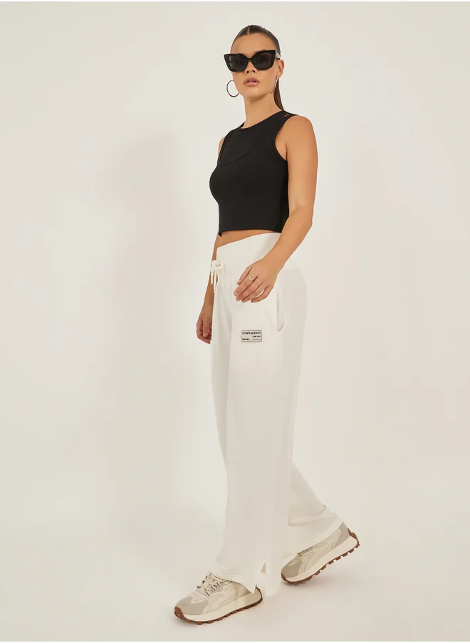 ستايلي Styli Badge Detail Wide Leg Joggers with Side Slit
