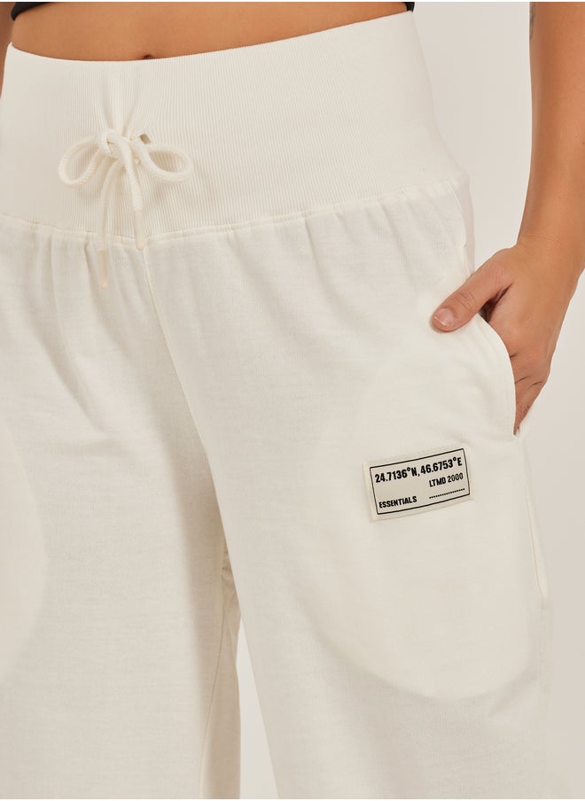 Styli Styli Badge Detail Wide Leg Joggers with Side Slit  - Image 4