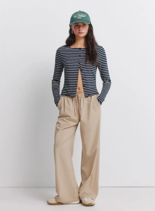 Springfield Jogger trousers with adjustable drawstring waist and leg width.