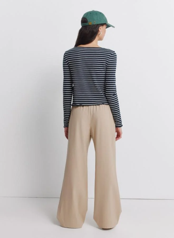 Springfield  Jogger trousers with adjustable drawstring waist and leg width. for Women | Best Price UAE