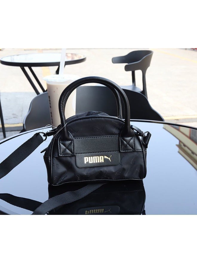 PUMA حقيبة يد صغيرة سوداء من بومّا (شعار ذهبي معدني + تفاصيل مبطنة) - Image 1