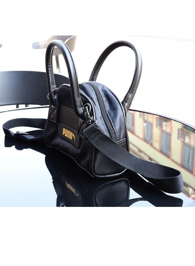 PUMA حقيبة يد صغيرة سوداء من بومّا (شعار ذهبي معدني + تفاصيل مبطنة) - Image 3
