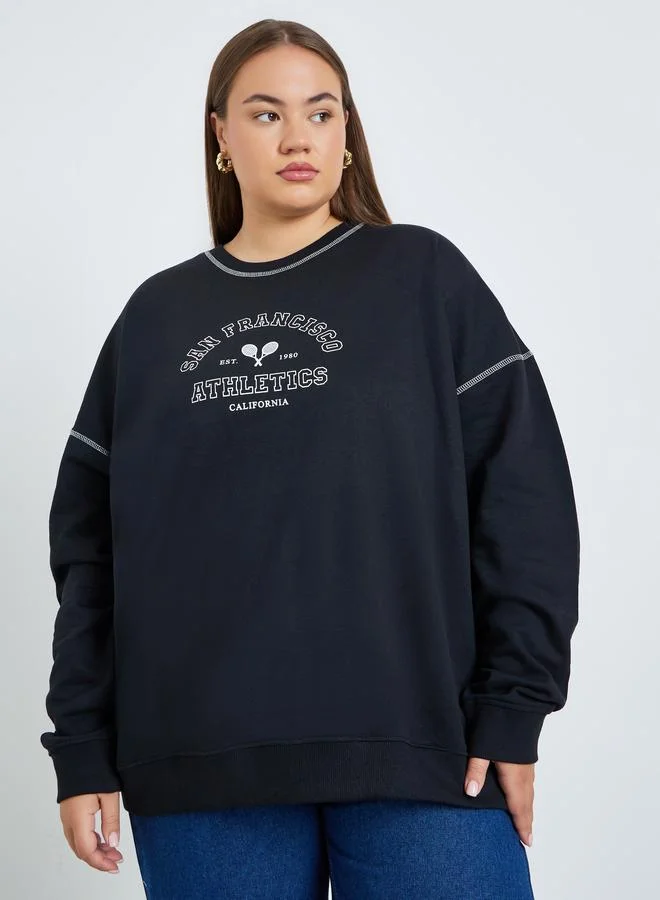 ستايلي سويت شيرت واسع بمقاس كبير وطبعة كتابة