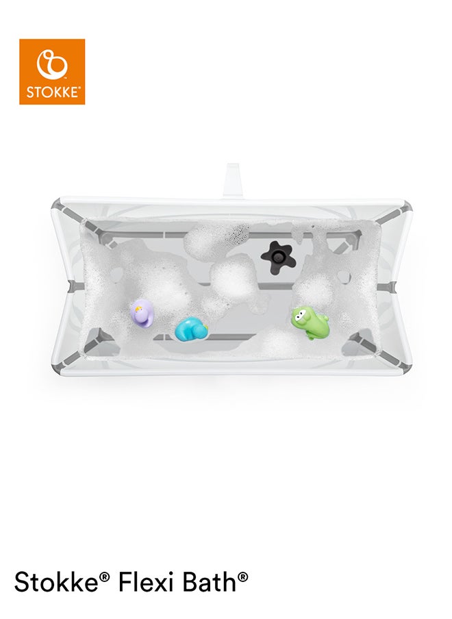 STOKKE - Flexi Bath X - Large, Transparent Blue Spacious Foldable Baby Bath Tublight Weight And Easy To Store Convenient To Use At Home Or When Travelling Best For Ages 0 - 6, White - Image 1