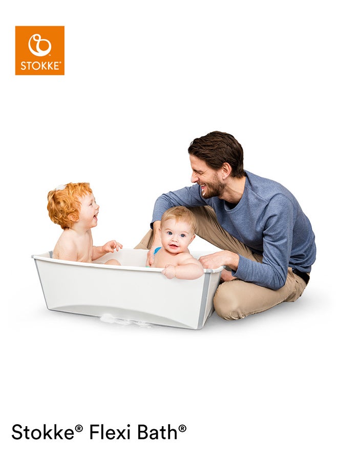 STOKKE - Flexi Bath X - Large, Transparent Blue Spacious Foldable Baby Bath Tublight Weight And Easy To Store Convenient To Use At Home Or When Travelling Best For Ages 0 - 6, White - Image 1