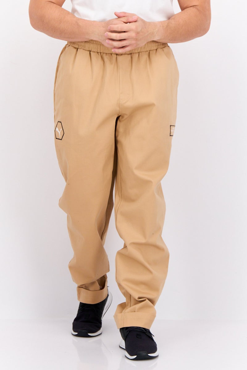 Puma x Porsche Design Men Sportswear Fit Training Sweatpants, Tan - Image 1