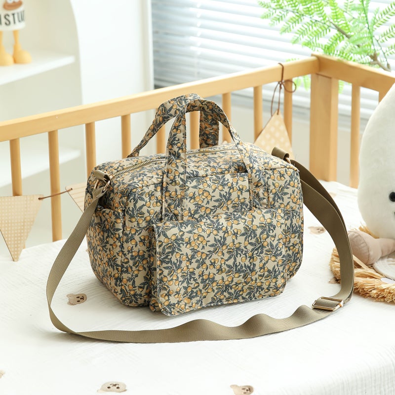 حقيبة والديين متعددة الوظائف بلون الكاكي مع لوح تغيير حفاضات ومنظم للزجاجات والمناديل - Image 1