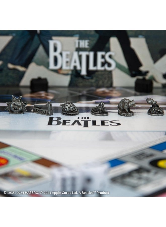USA أوبولي Monopoly: The Beatles، العب بدور Rocky Raccoon، وMaxwell's Silver Hammer، وI Am The Walrus والمزيد، لعبة تجميعية مرخصة رسميًا استنادًا إلى The Beatles Rock Band لعدد يتراوح من 2 إلى 6 لاعبين - Image 3
