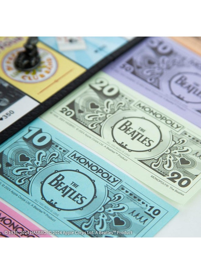 USA أوبولي Monopoly: The Beatles، العب بدور Rocky Raccoon، وMaxwell's Silver Hammer، وI Am The Walrus والمزيد، لعبة تجميعية مرخصة رسميًا استنادًا إلى The Beatles Rock Band لعدد يتراوح من 2 إلى 6 لاعبين - Image 4