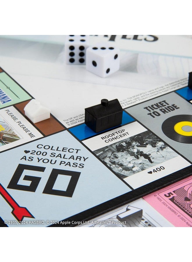 USA أوبولي Monopoly: The Beatles، العب بدور Rocky Raccoon، وMaxwell's Silver Hammer، وI Am The Walrus والمزيد، لعبة تجميعية مرخصة رسميًا استنادًا إلى The Beatles Rock Band لعدد يتراوح من 2 إلى 6 لاعبين - Image 5
