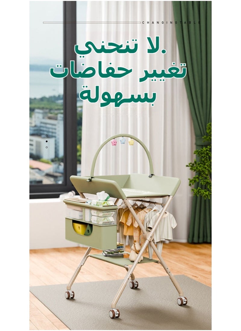 شو وو - طاولة تغيير حفاضات محمولة، محطة تغيير حفاضات قابلة للطي مع عجلات قابلة للقفل، 3 مستويات ارتفاع قابلة للتعديل، مع رفوف تعليق لسلة تخزين للأطفال حديثي الولادة، أخضر - Image 1