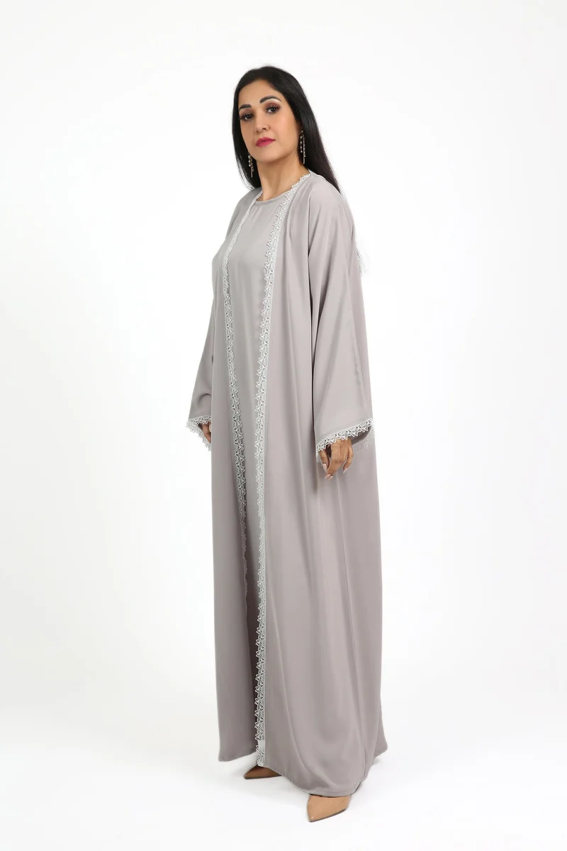 Nikias Nida abaya set with inner lining. Features delicate white lace, soft and comfortable for everyday wear, complete with a matching sheila.