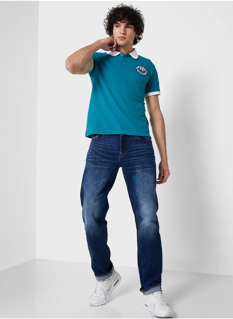 Seventy Five Varsity Polo W. Patch