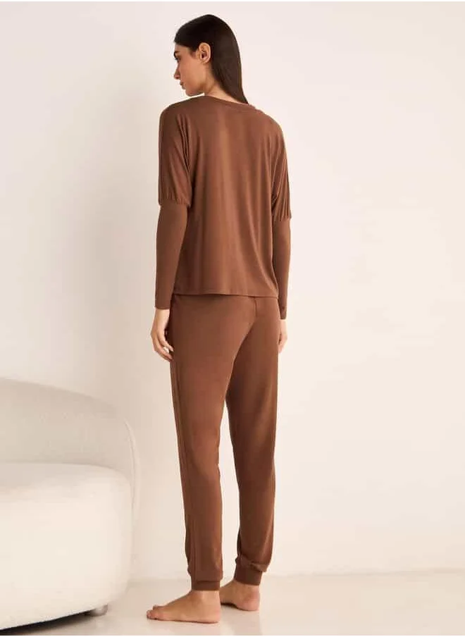 Aadaraya Aadaraya Drop Shoulder Long Sleeve T-shirt and Elasticated Joggers Set