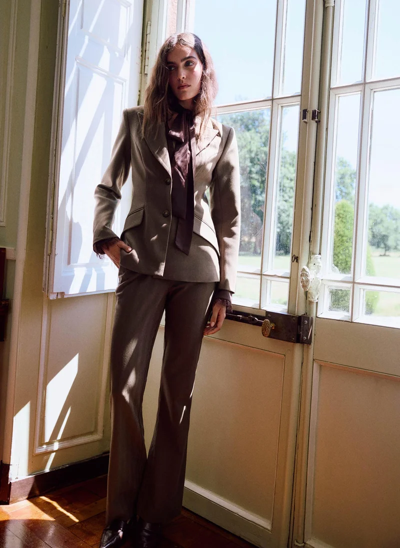 Lichi  Fitted jacket with slanted side pockets for Women | Best Price UAE