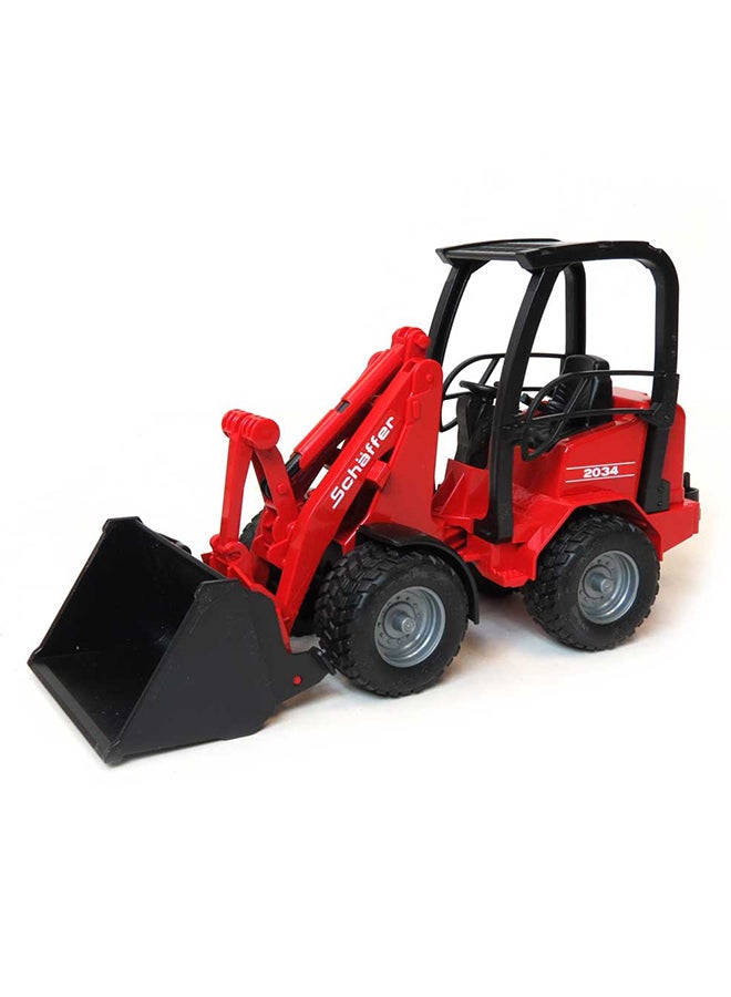 Bruder - Schaffer Compact Loader Red 29.5x9.6x15.7cm - Image 1