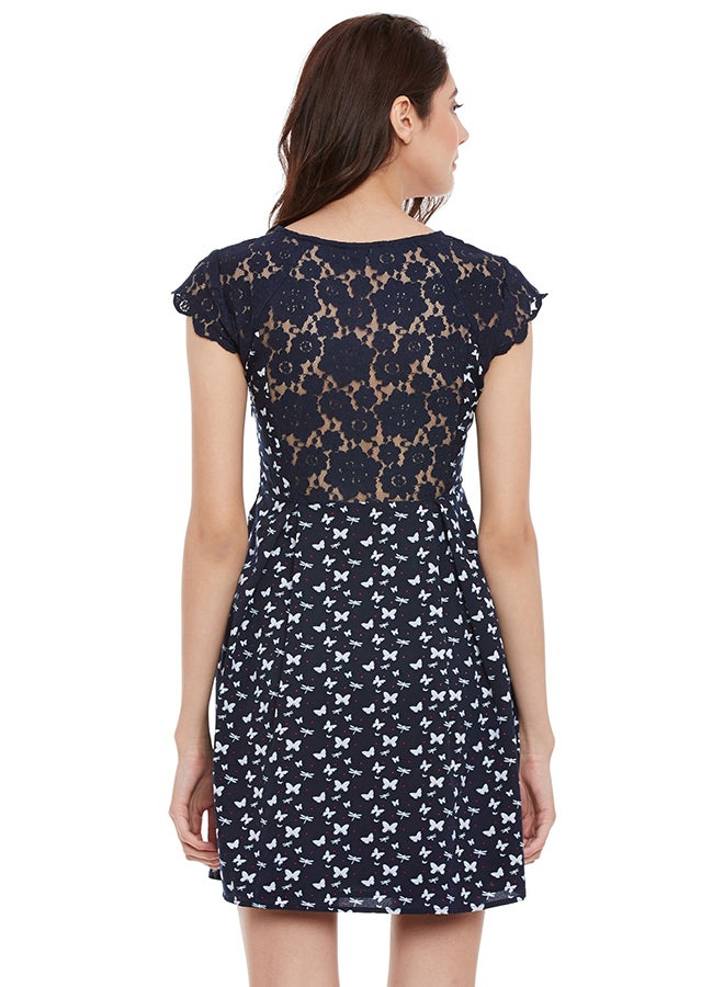 THE VANCA - Cap Sleeve Printed Skater Dress Navy - Image 1