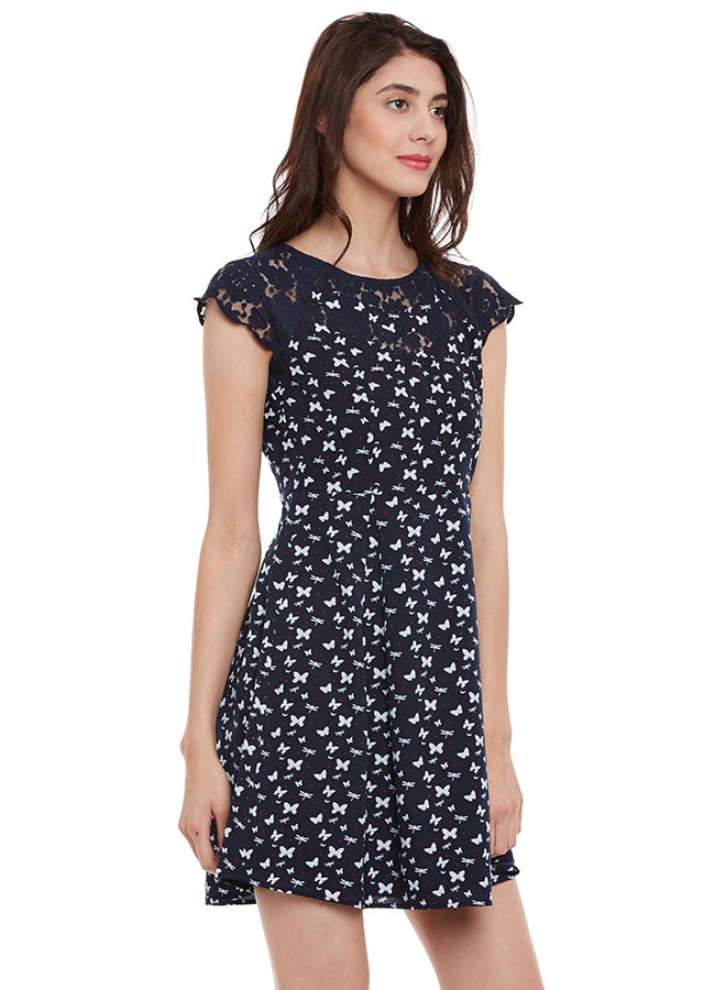THE VANCA - Cap Sleeve Printed Skater Dress Navy - Image 1