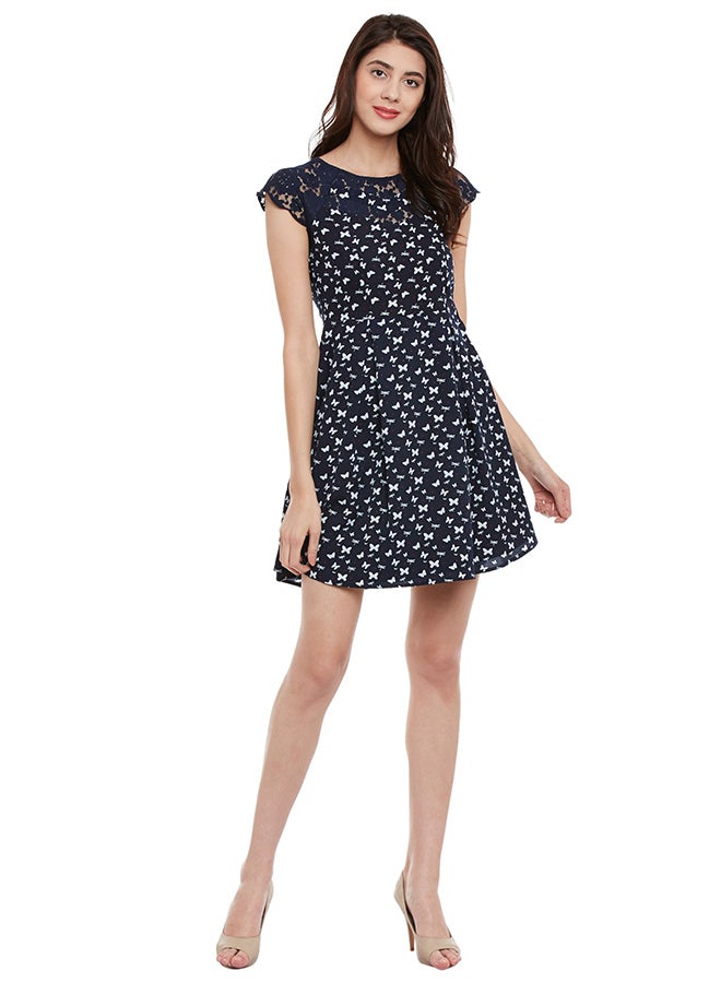 THE VANCA - Cap Sleeve Printed Skater Dress Navy - Image 1