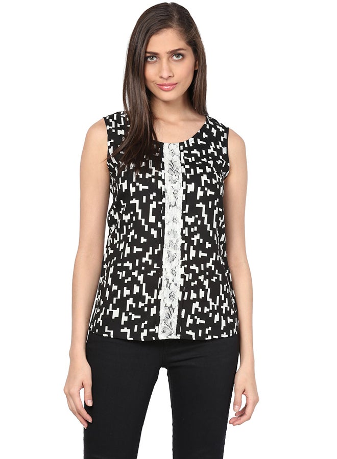 THE VANCA Sleeveless Flared Top Black/White - Image 1