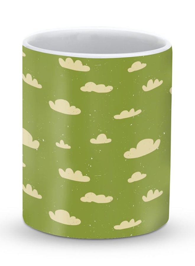 Stylizedd Premium Wandering Clouds Designer Mug Green/Yellow - Image 1