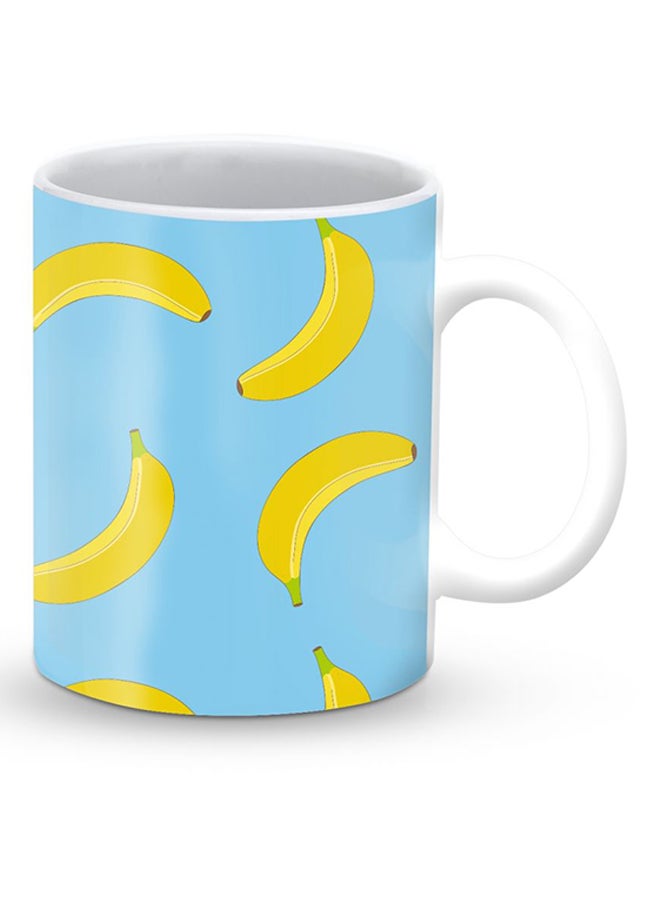 ستايلايزد قدح قهوة فاخر بتصميم الموز المتدحرج أزرق/أصفر 325ملليلتر - Image 2