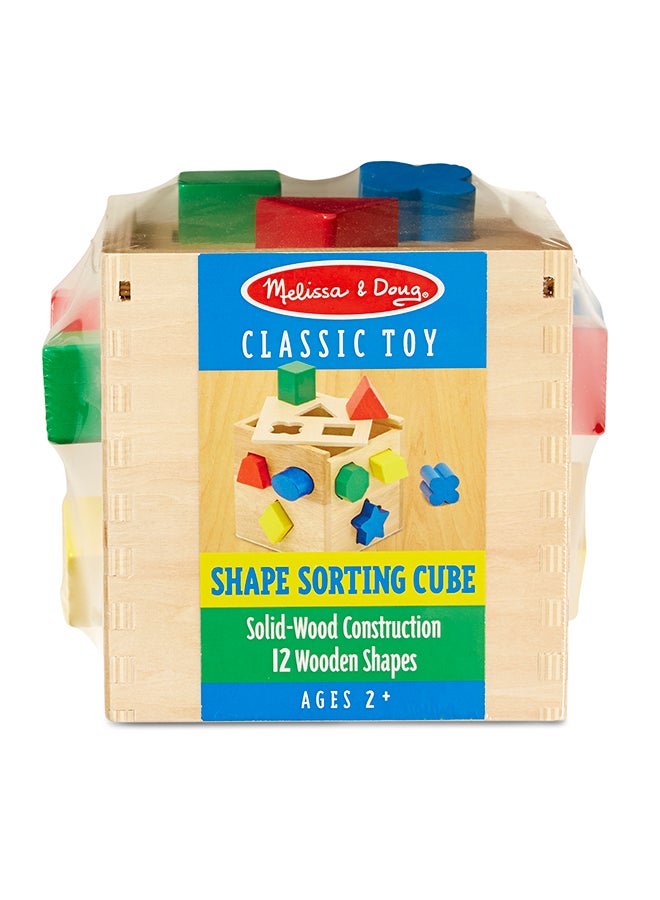 Melissa & Doug Shape Sorting Cube – Classic Wooden Toy with 12 Colorful Shapes and Matching Holes – Hands-On Shape Recognition and Fine Motor Skills Learning for Toddlers & Kids Ages 2 and Up | MD575 - Image 1